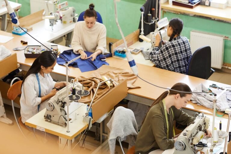 people-sewing-in-workshop-VAPQXVU